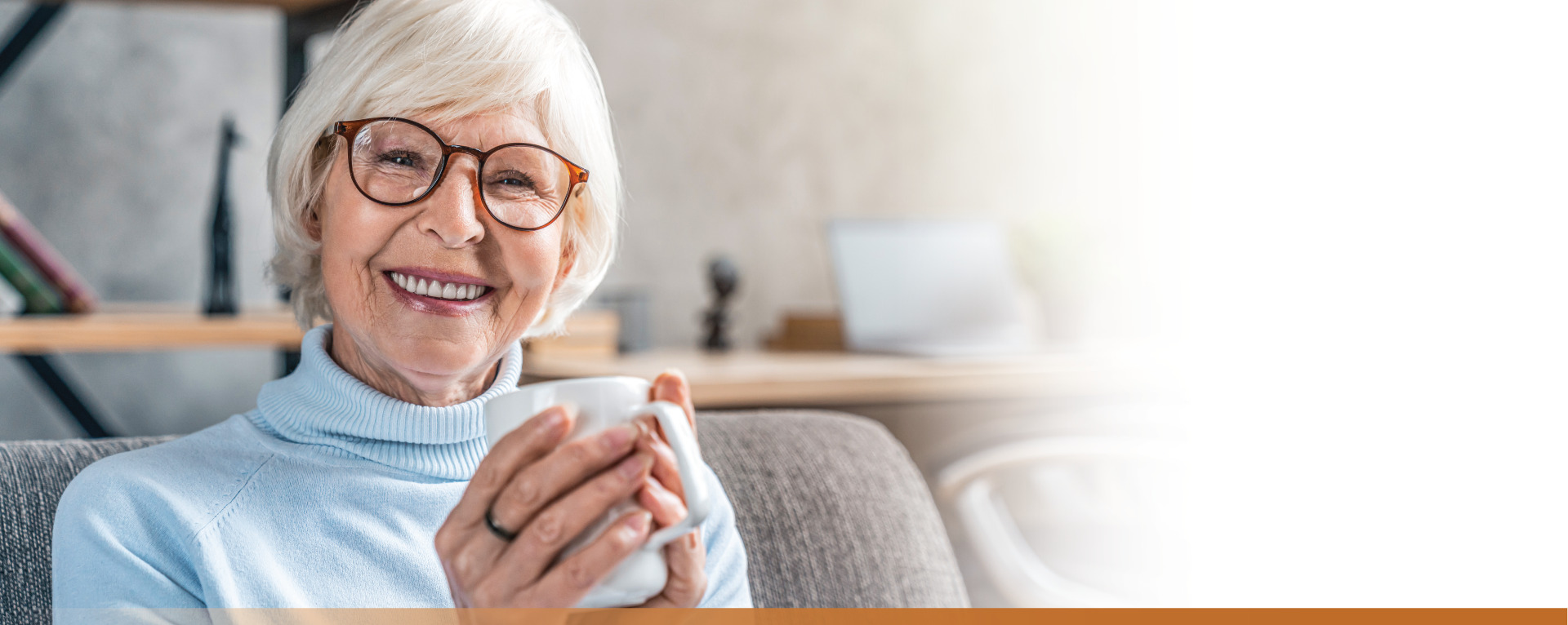 Senior woman holding a coffee cup