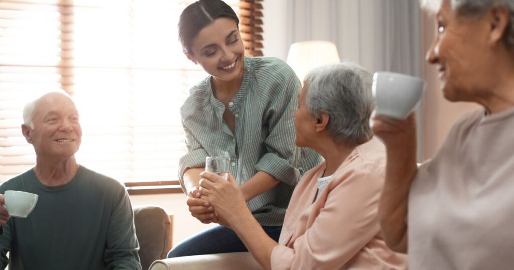 Team members helping seniors