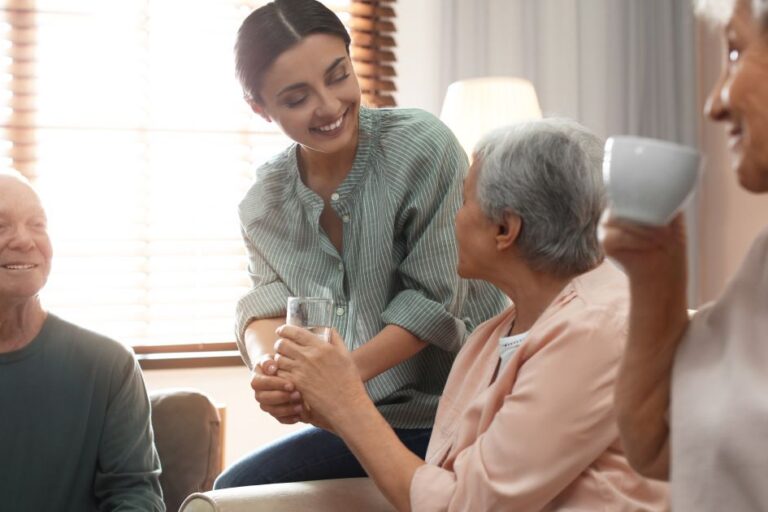 Team members helping seniors